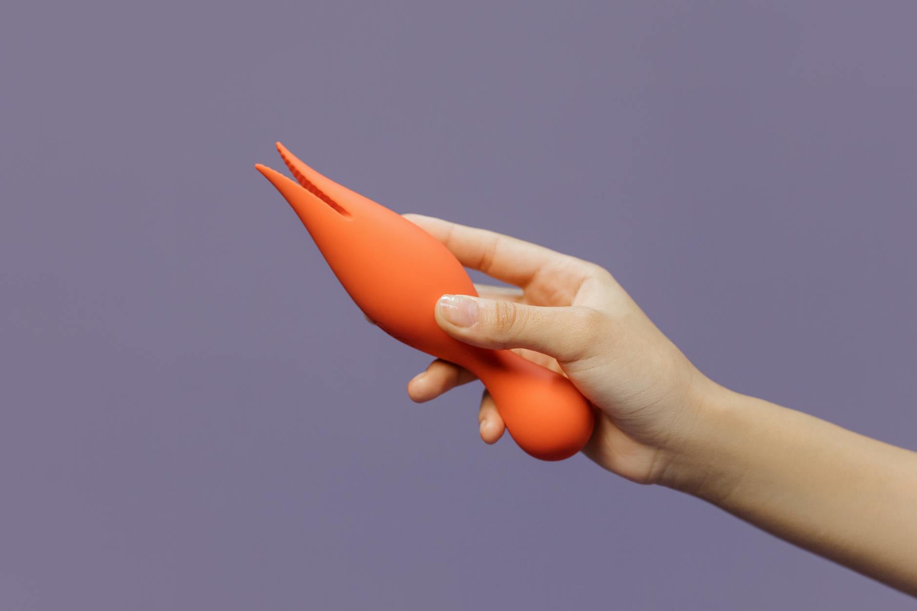 A young couple standing together indoors, exploring intimacy with modern tools for reconnection.