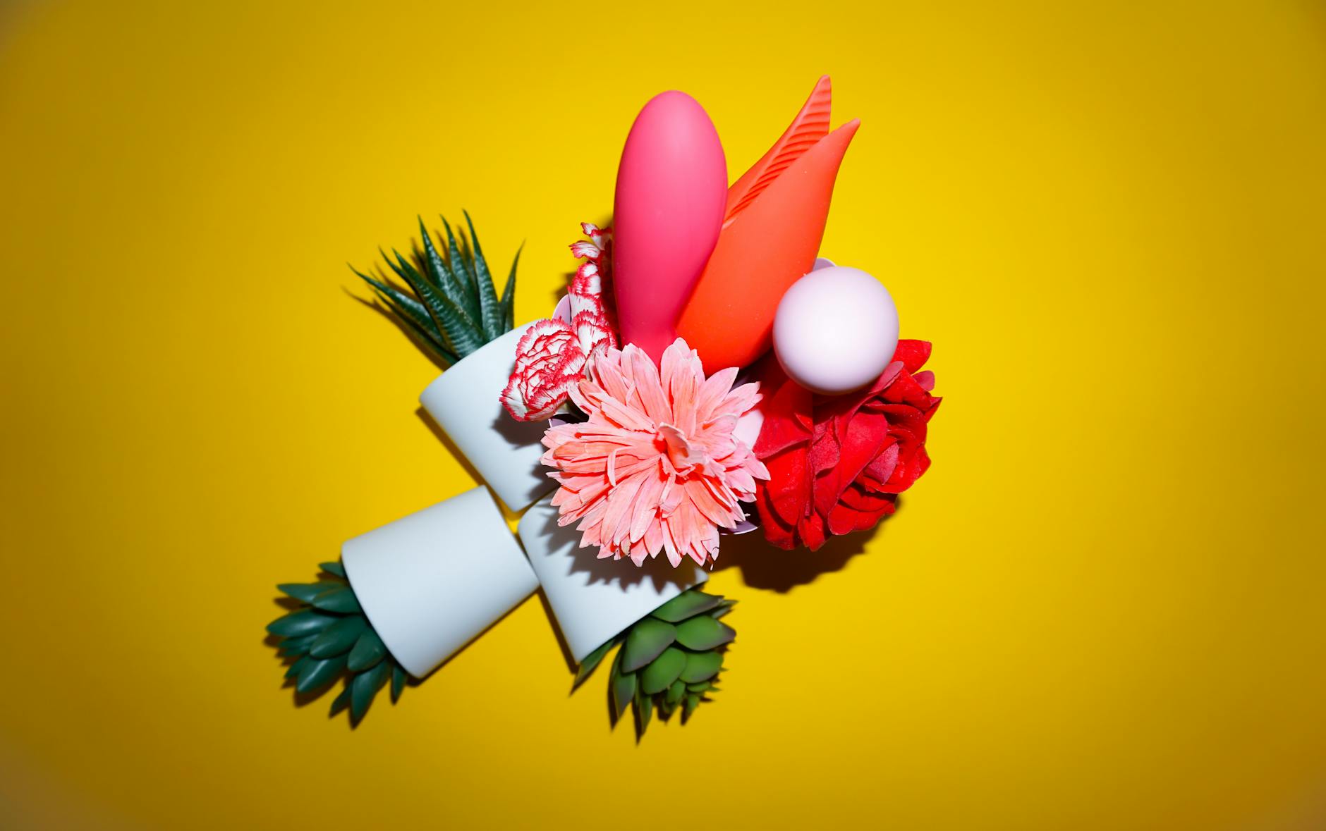 Bright yellow lemons arranged on a pastel background, representing the lemon clitoral vibrator experience